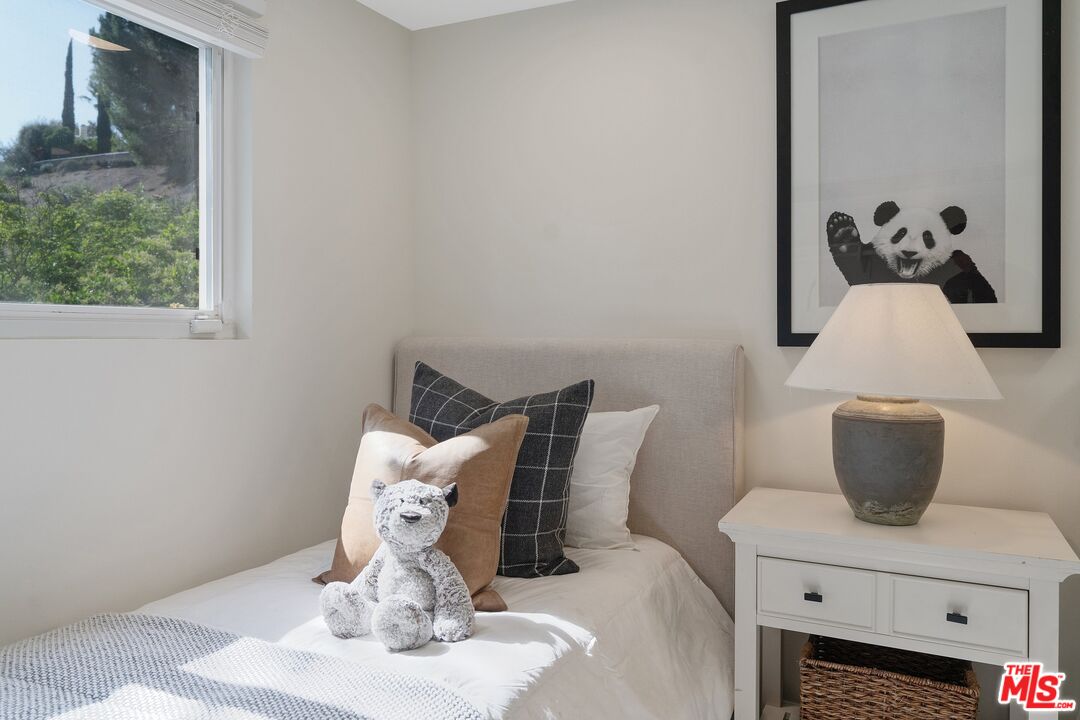 22801 Pera Road Woodland Hills, CA 91364 - Photo 29 of 46 a view of a dining room with furniture