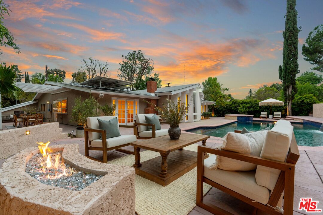 22801 Pera Road Woodland Hills, CA 91364 - Photo 36 of 46 a view of swimming pool with outdoor seating