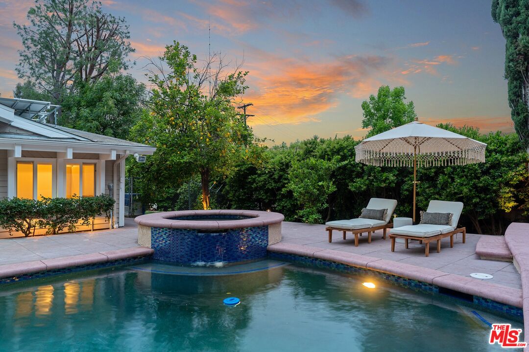 22801 Pera Road Woodland Hills, CA 91364 - Photo 38 of 46 a view of swimming pool with outdoor seating