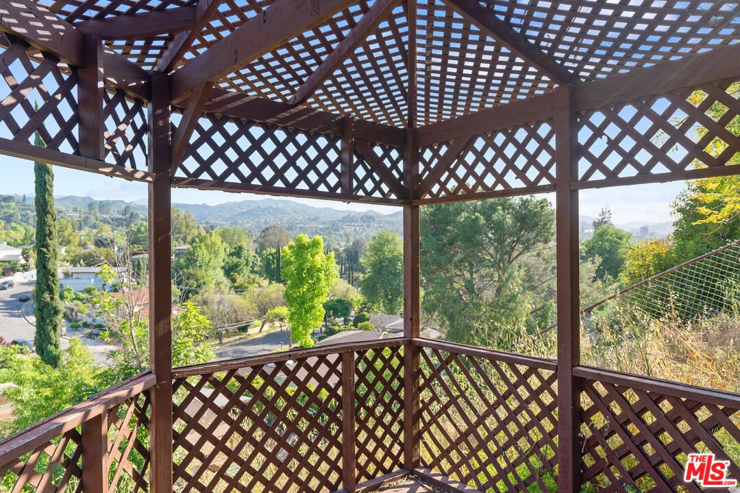 22801 Pera Road Woodland Hills, CA 91364 - Photo 44 of 46 a front view of a yard