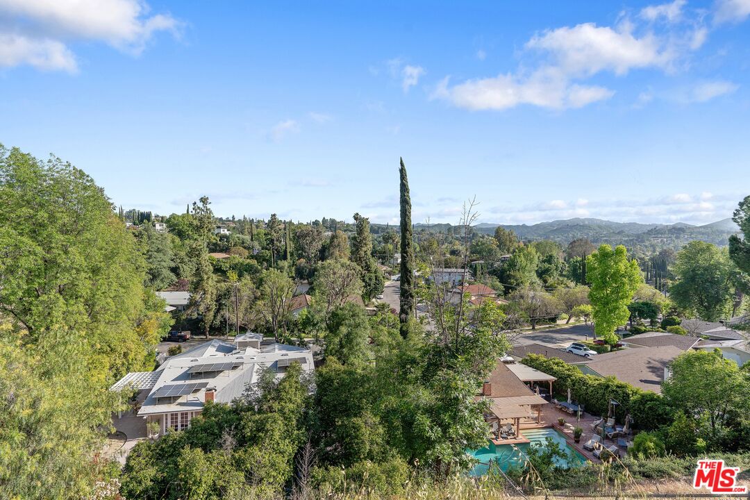 22801 Pera Road Woodland Hills, CA 91364 - Photo 45 of 46 a view of a garden with houses