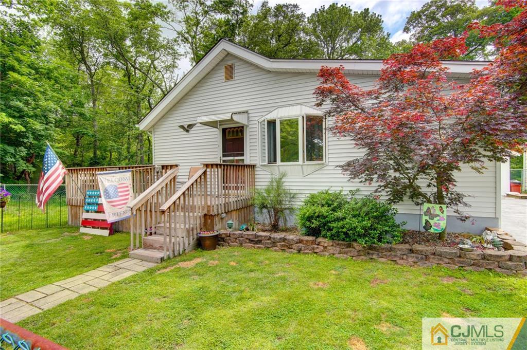60 Brookside Road Spotswood, NJ 08884 - Photo 1 of 34 a view of a house with a yard