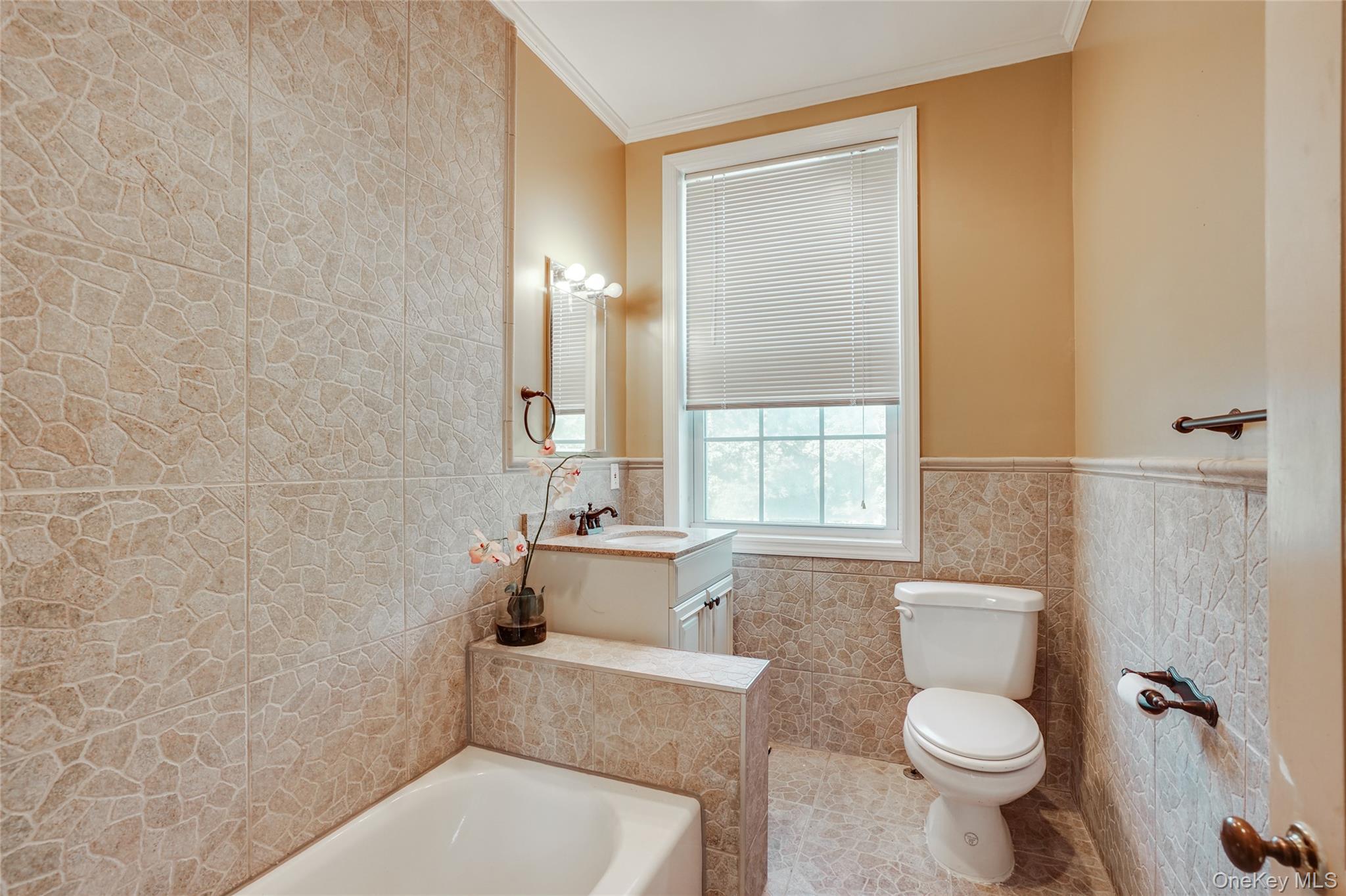 274 River Road St. James, NY 11780 - Photo 19 of 30 a bathroom with a toilet a sink and a shower