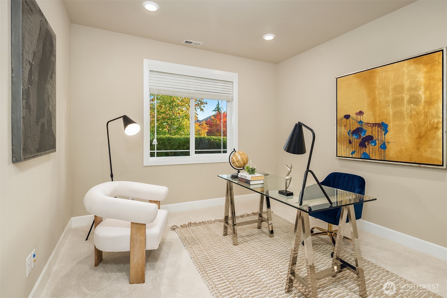 4111 174th Street Southeast Bothell, WA 98012 - Photo 19 of 40 a view of a workspace with furniture and a window