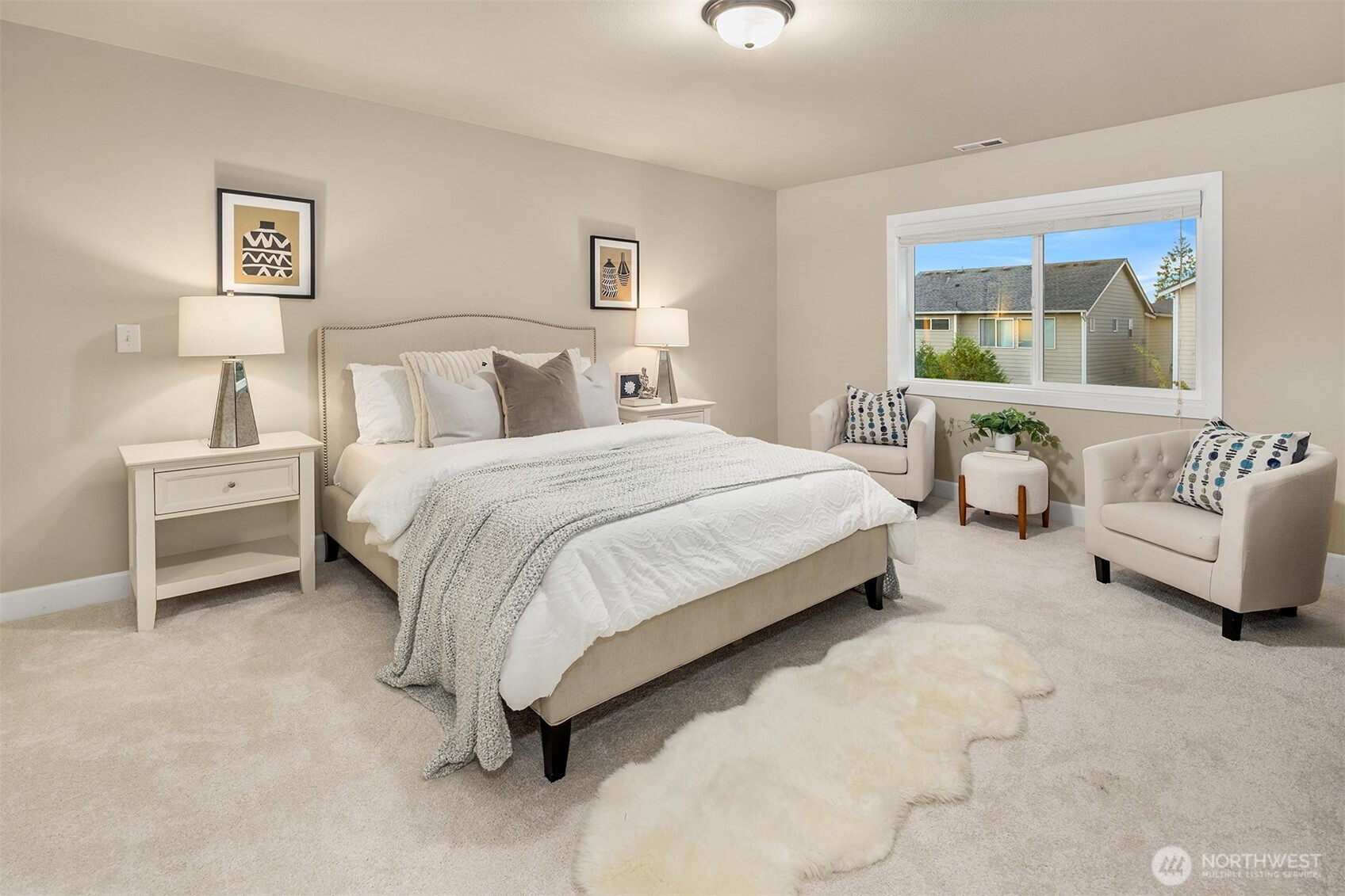 4111 174th Street Southeast Bothell, WA 98012 - Photo 25 of 40 a bedroom with bed and a couch