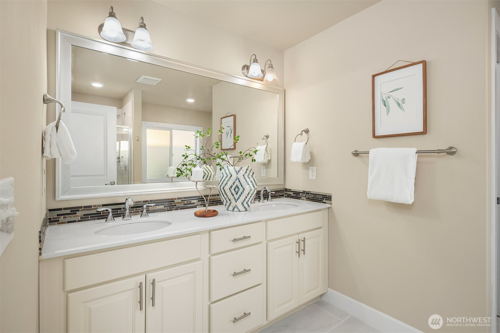 4111 174th Street Southeast Bothell, WA 98012 - Photo 27 of 40 a bathroom with a sink and a mirror