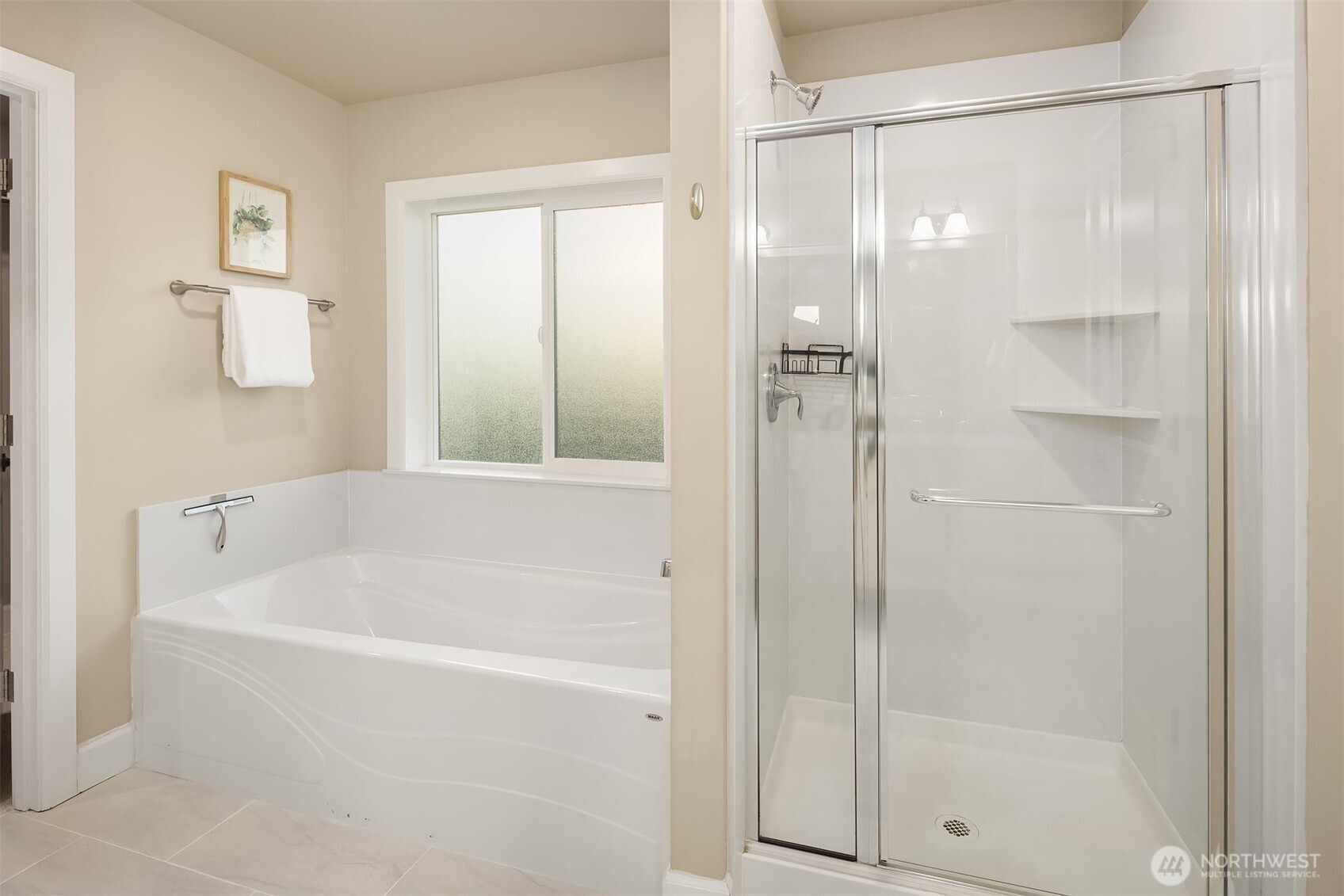 4111 174th Street Southeast Bothell, WA 98012 - Photo 28 of 40 a bathroom with a bathtub and a shower
