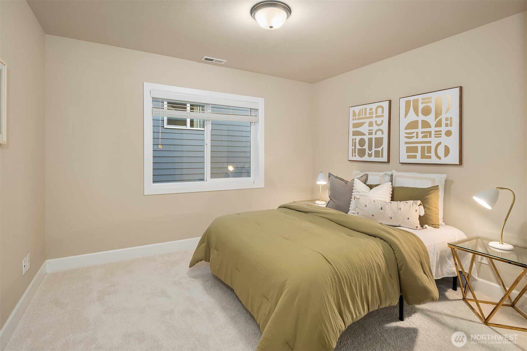 4111 174th Street Southeast Bothell, WA 98012 - Photo 30 of 40 a bedroom with a bed and wooden floor