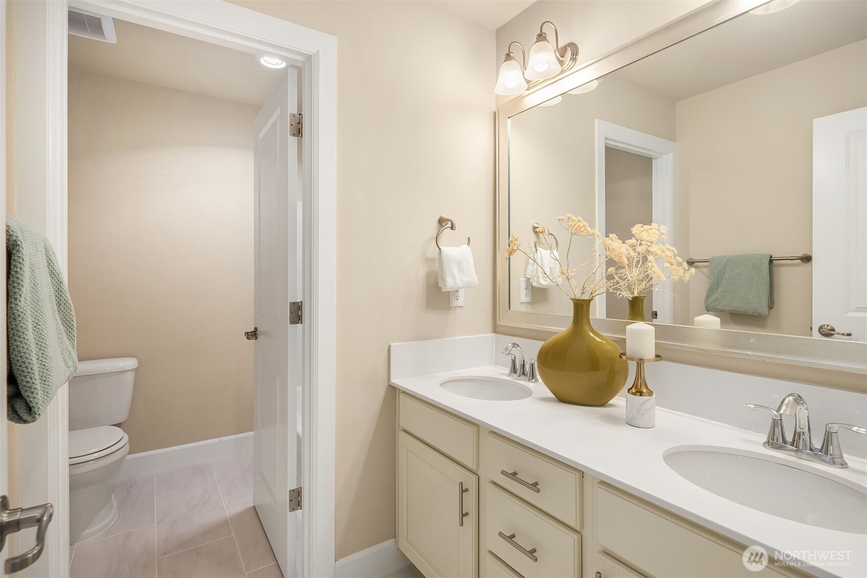 4111 174th Street Southeast Bothell, WA 98012 - Photo 33 of 40 a bathroom with a granite countertop sink a toilet and a mirror