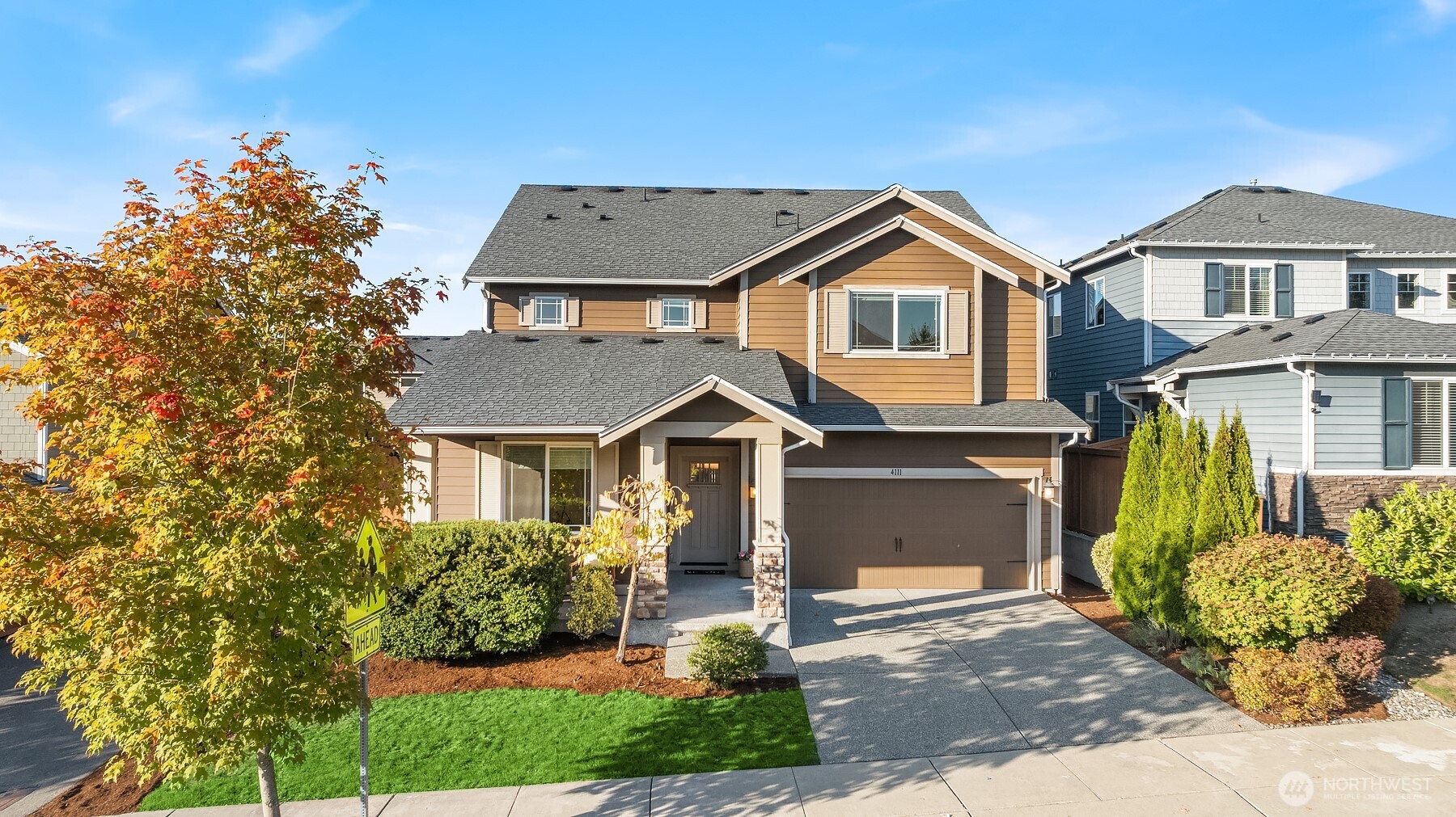 4111 174th Street Southeast Bothell, WA 98012 - Photo 37 of 40 a front view of a house with garden