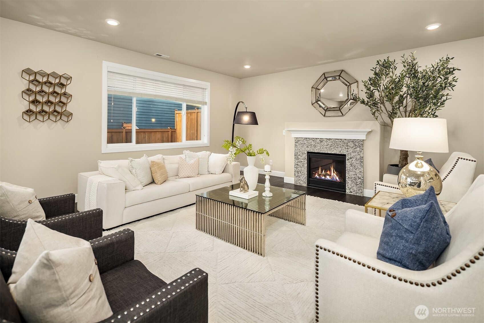 4111 174th Street Southeast Bothell, WA 98012 - Photo 5 of 40 a living room with furniture and a fireplace