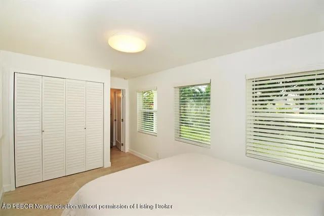 a view of a room with a large window