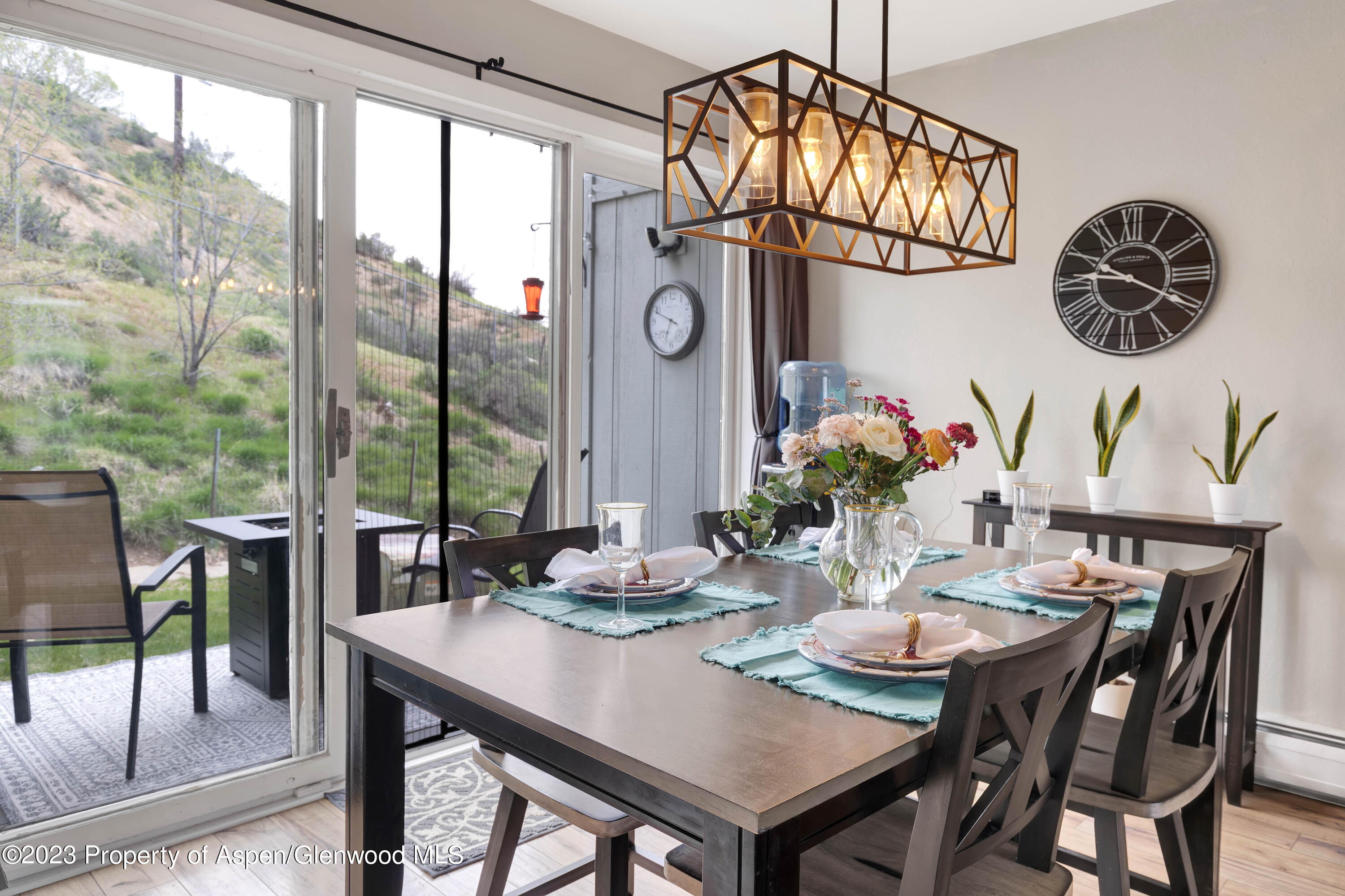 1173 Park Avenue Rifle, CO 81650 - Photo 10 of 26 a view of a dining area with furniture window and outside view