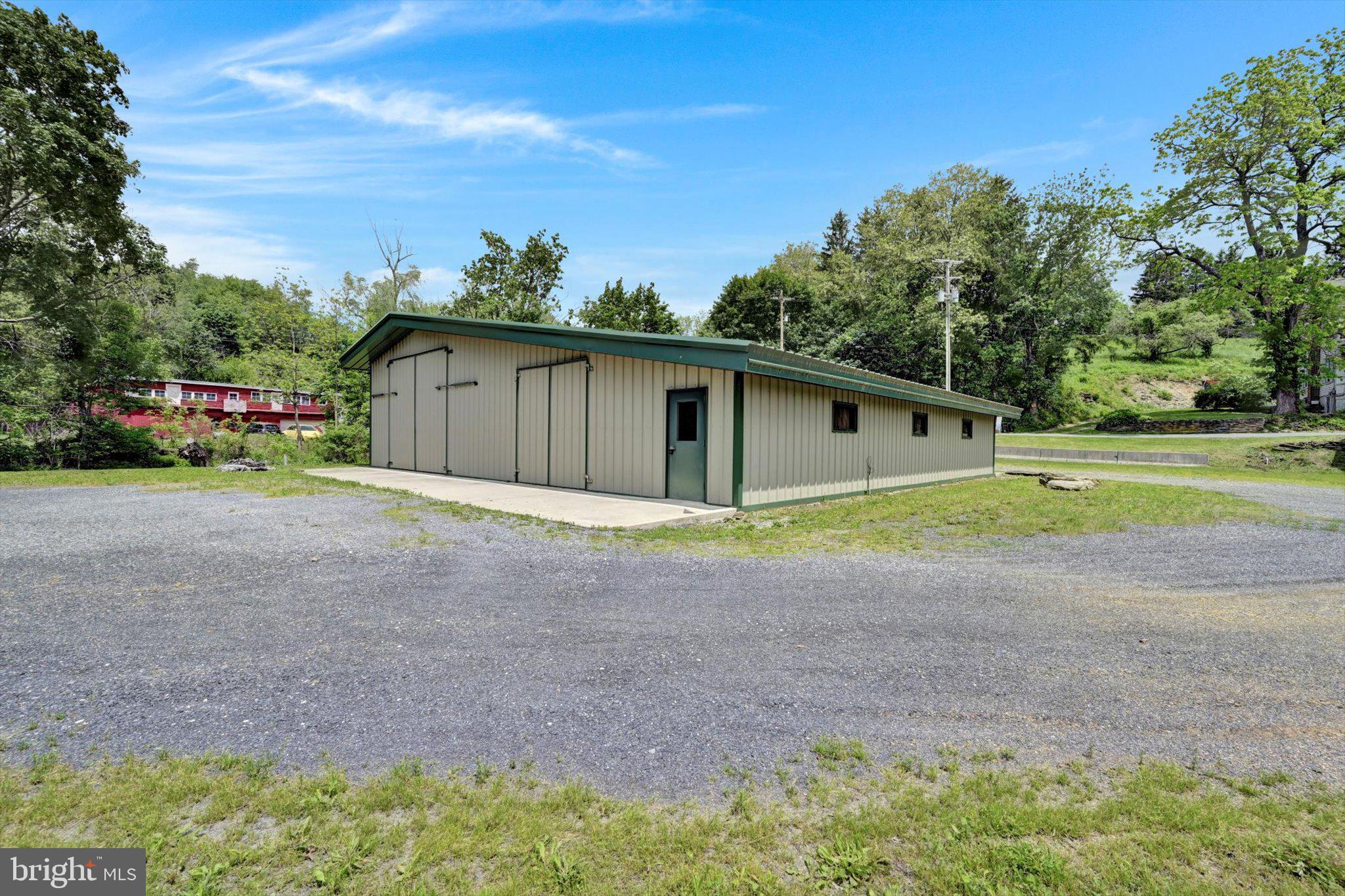 235 Stump Road Kutztown, PA 19530 - Photo 13 of 38 a view of a house with backyard and trees