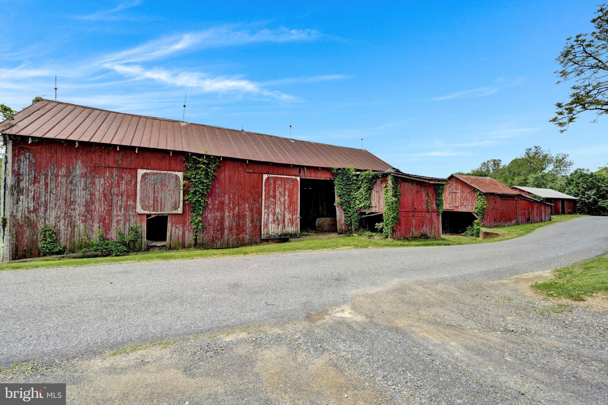 235 Stump Road Kutztown, PA 19530 - Photo 8 of 38 a front view of a house with a yard and garage