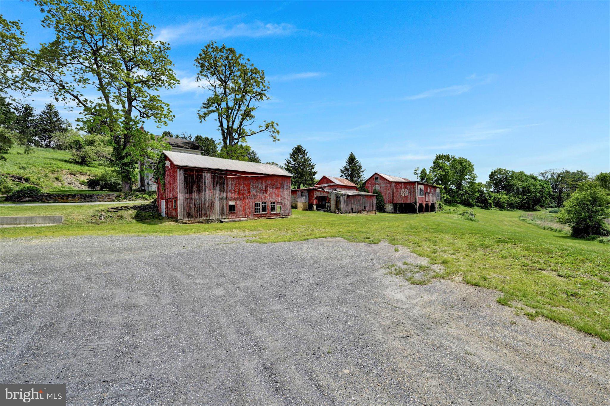 235 Stump Road Kutztown, PA 19530 - Photo 10 of 38 a view of an house with backyard and a tree