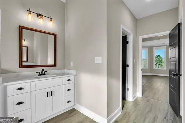 a view of a room with racks on the wall