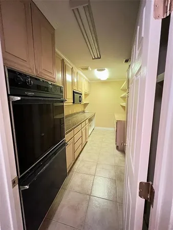 a view of storage and utility room in empty room