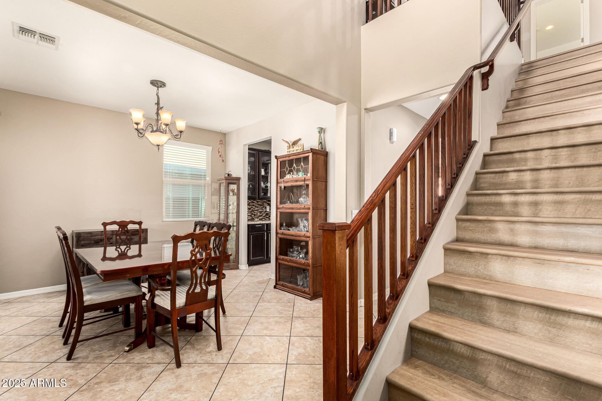 16763 West Adams Street Goodyear, AZ 85338 - Photo 6 of 42 Upgraded Staircase