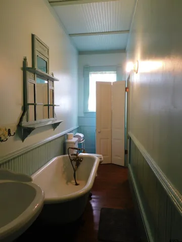 a view of a livingroom with furniture and window