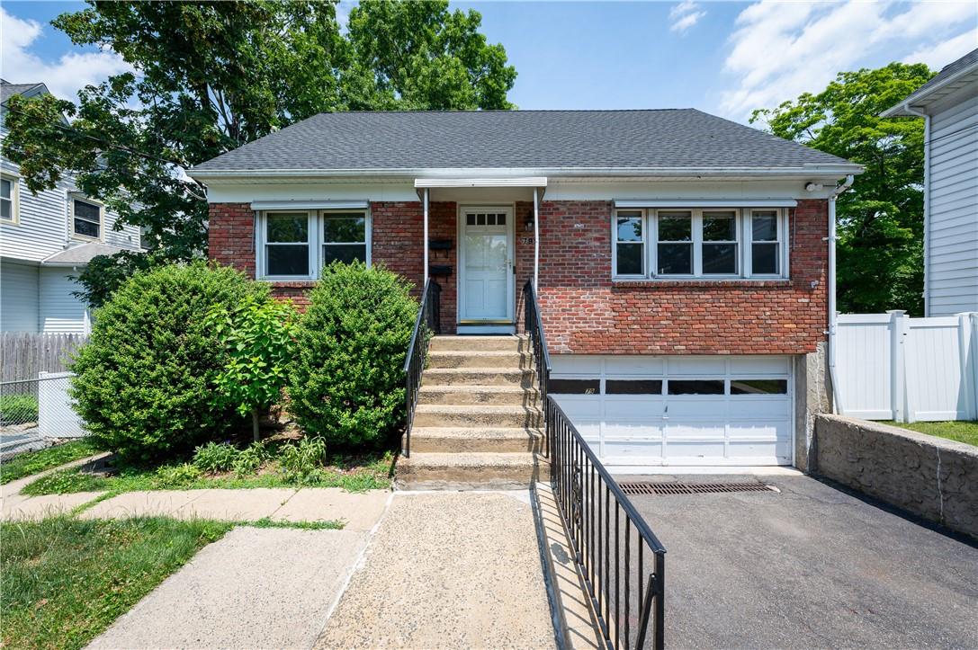 79 Broadway Harrison, NY 10528 - Photo 1 of 1 a front view of a house with a garden