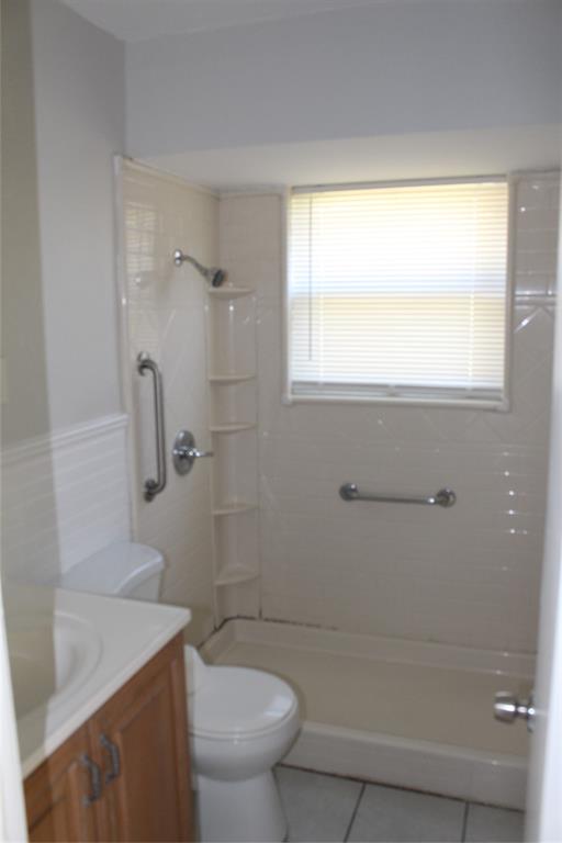1010 Appleblossom Lane Mesquite, TX 75149 - Photo 14 of 16 a bathroom with a sink a toilet and shower