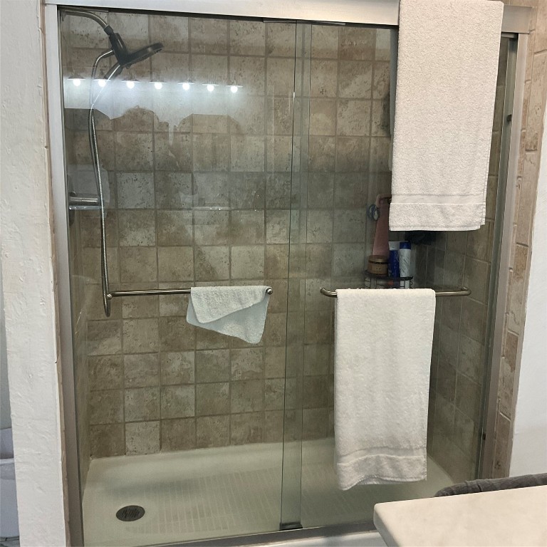 15159 County Road 1876 Odem, TX 78370 - Photo 15 of 23 a bathroom with a shower