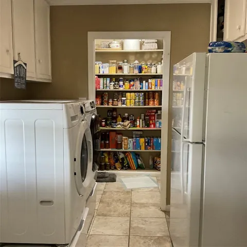 a bathroom with a sink mirror and vanity