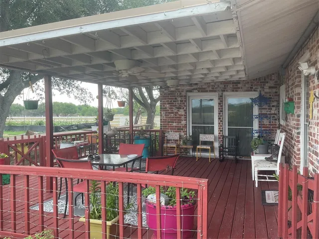 a view of a chairs and tables in the balcony