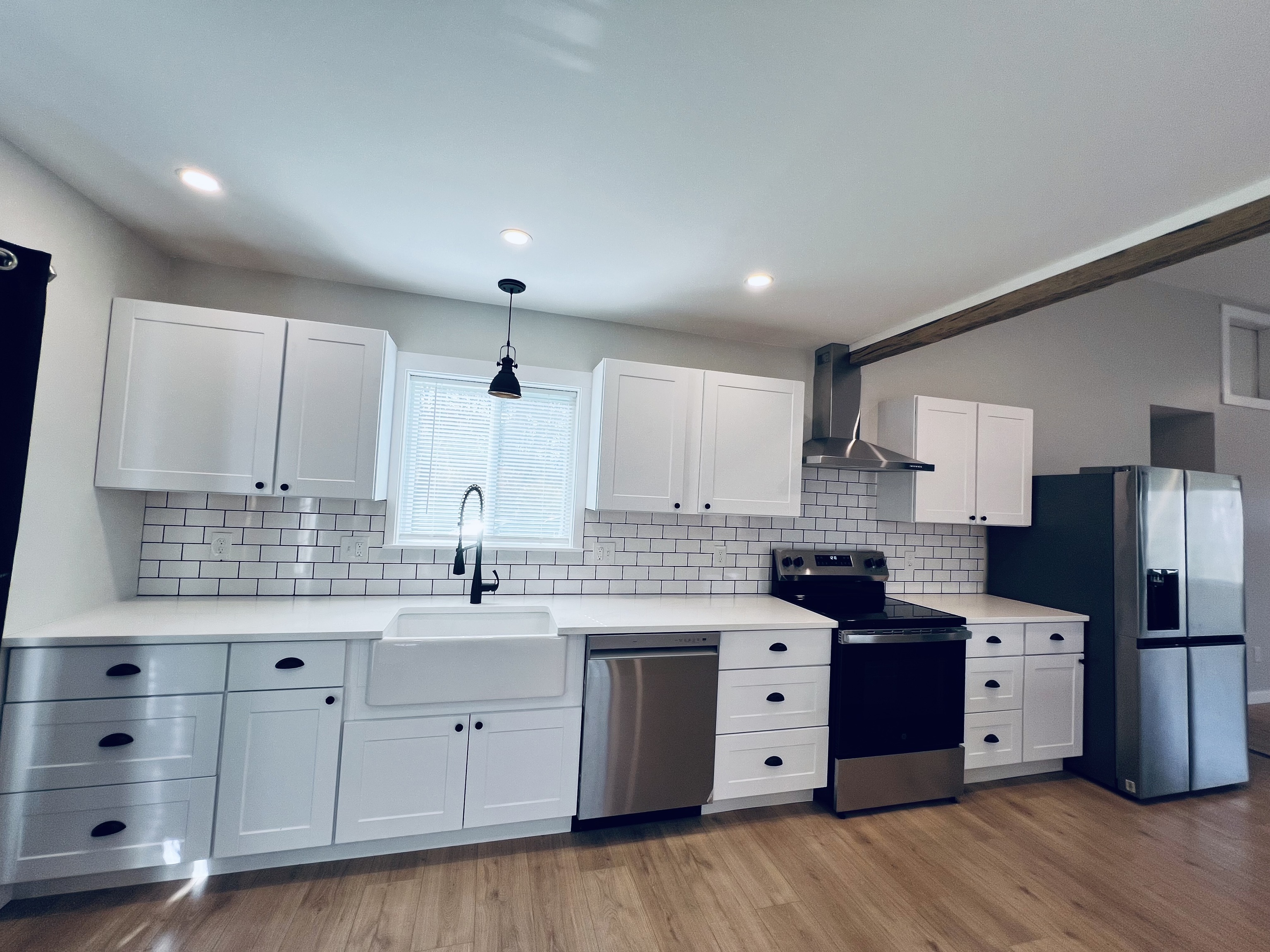 8 Rustic Road Ridgefield, CT 06877 - Photo 4 of 18 a kitchen with stainless steel appliances granite countertop a sink stove and refrigerator