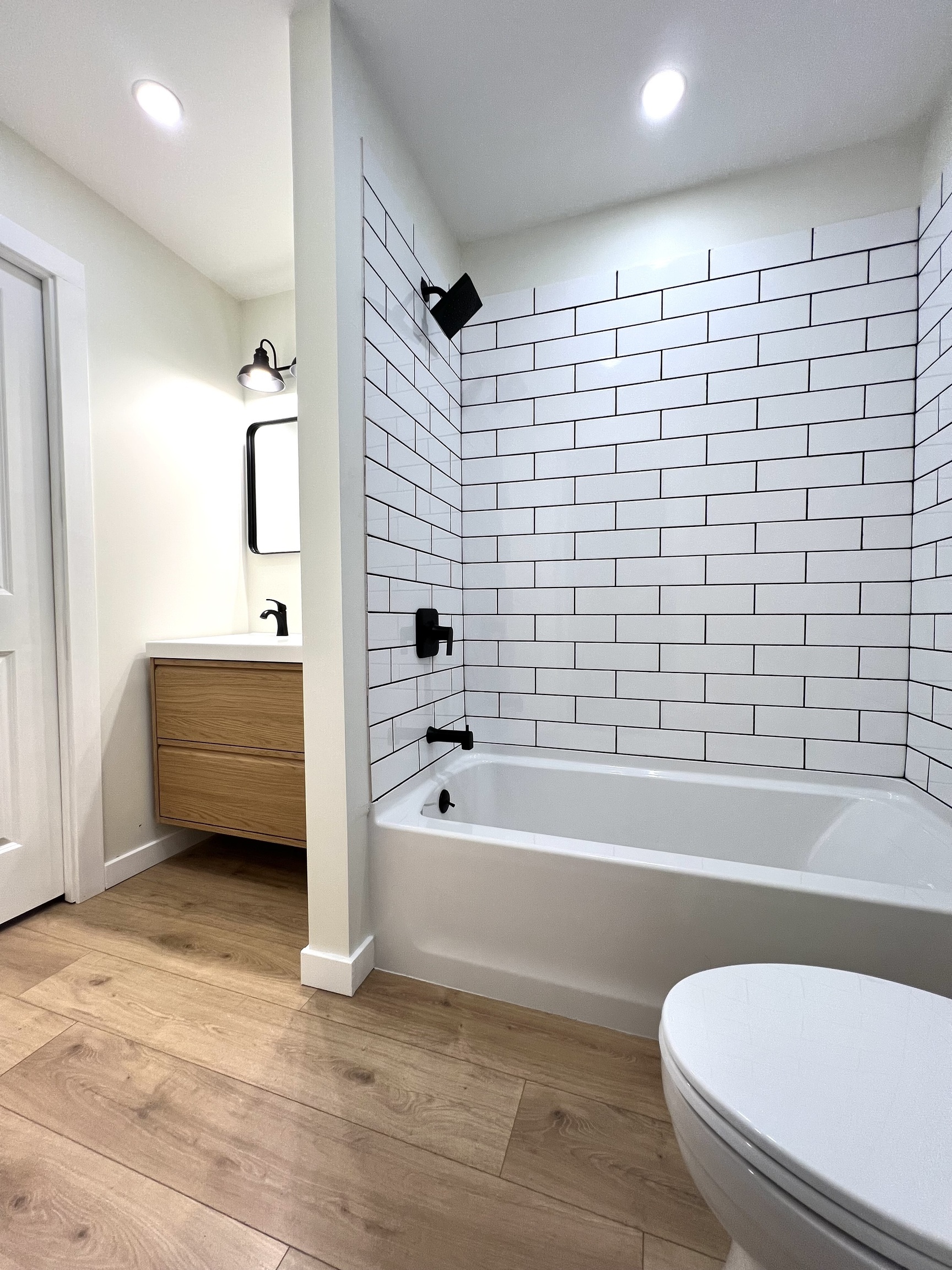 8 Rustic Road Ridgefield, CT 06877 - Photo 8 of 18 a bathroom with a toilet bathtub and shower