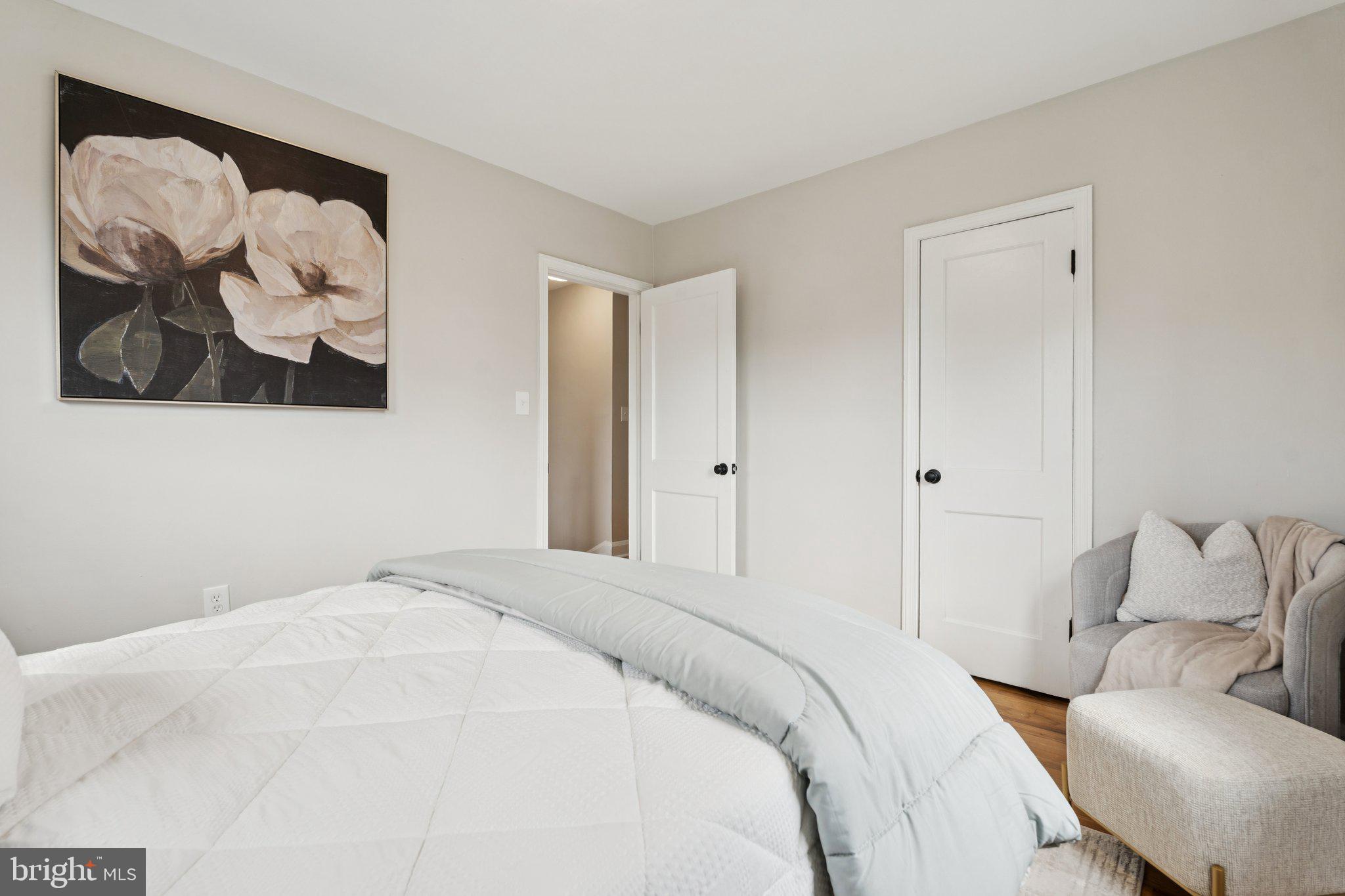 1014 Upnor Road Baltimore, MD 21212 - Photo 20 of 25 a bedroom with a bed and wall painting