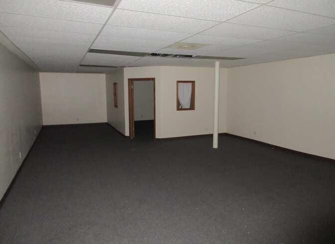 521 South State Street Belvidere, IL 61008 - Photo 12 of 49 a view of a livingroom with an empty space and a window