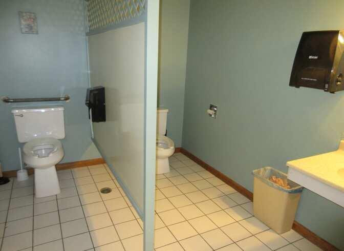 521 South State Street Belvidere, IL 61008 - Photo 15 of 49 a bathroom with a toilet and a shower