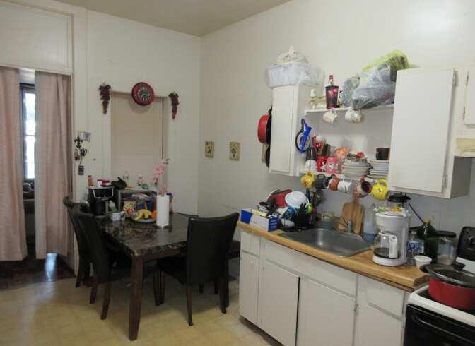 521 South State Street Belvidere, IL 61008 - Photo 37 of 49 a kitchen with a sink and cabinets