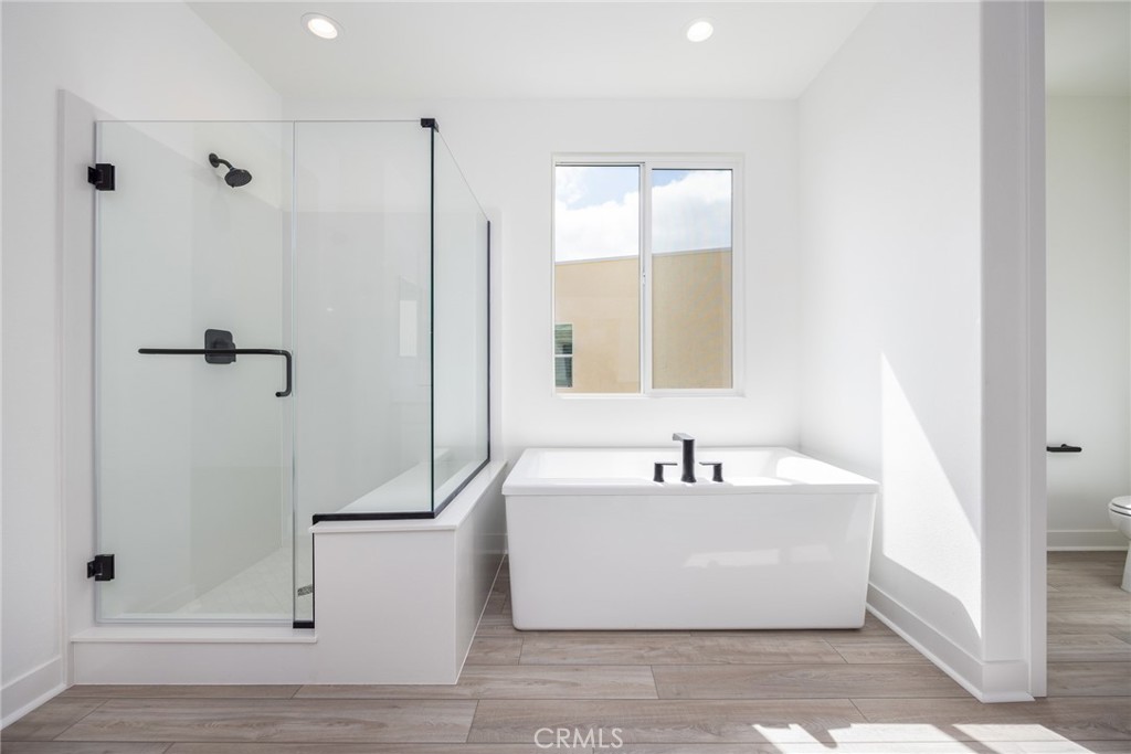 478 Chorus Irvine, CA 92618 - Photo 15 of 33 a white bath tub sitting next to a white sink