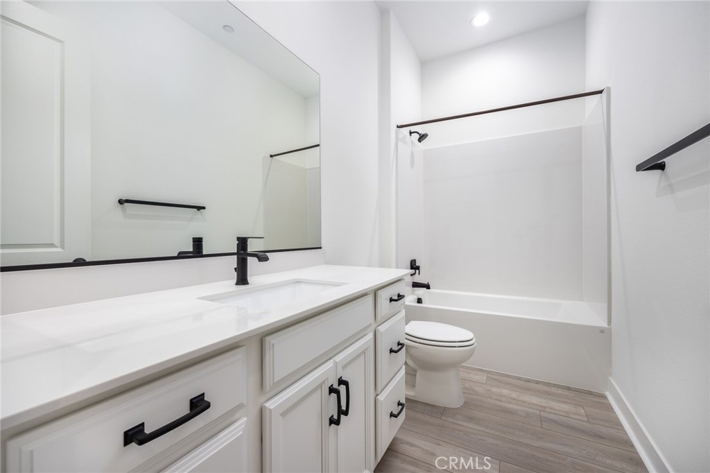 478 Chorus Irvine, CA 92618 - Photo 9 of 33 a bathroom with a sink a toilet and shower