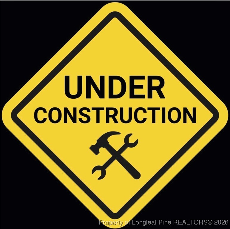 205 4th Street Erwin, NC 28339 - Photo 4 of 4 a sign broad on wooden wall