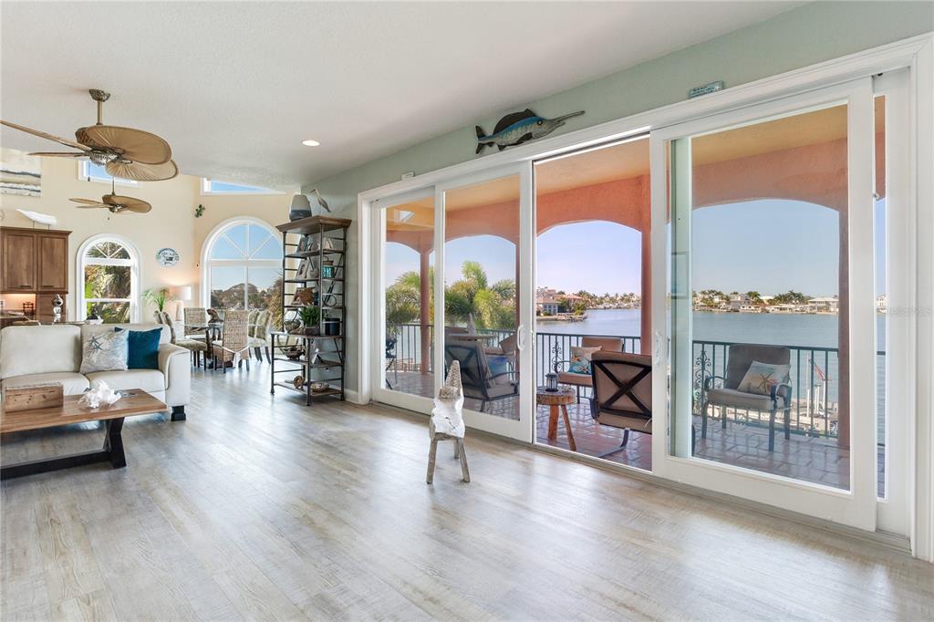 16480 Redington Drive Redington Beach, FL 33708 - Photo 22 of 93 a living room with furniture and a large window