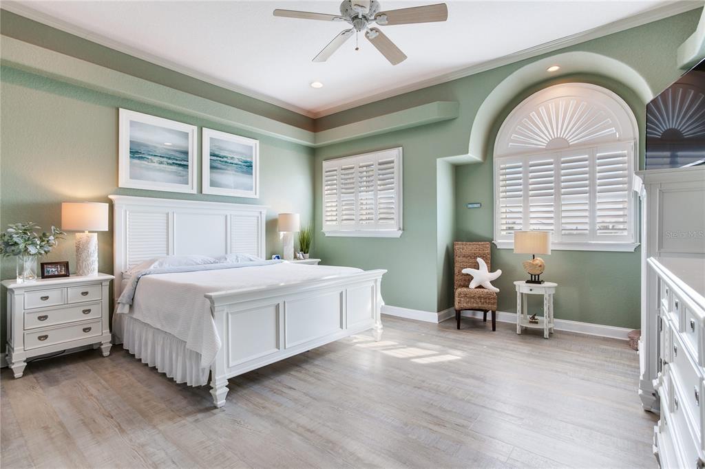 16480 Redington Drive Redington Beach, FL 33708 - Photo 28 of 93 a spacious bedroom with a bed and a window