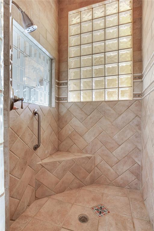 16480 Redington Drive Redington Beach, FL 33708 - Photo 33 of 93 a living room with a large window and a couch