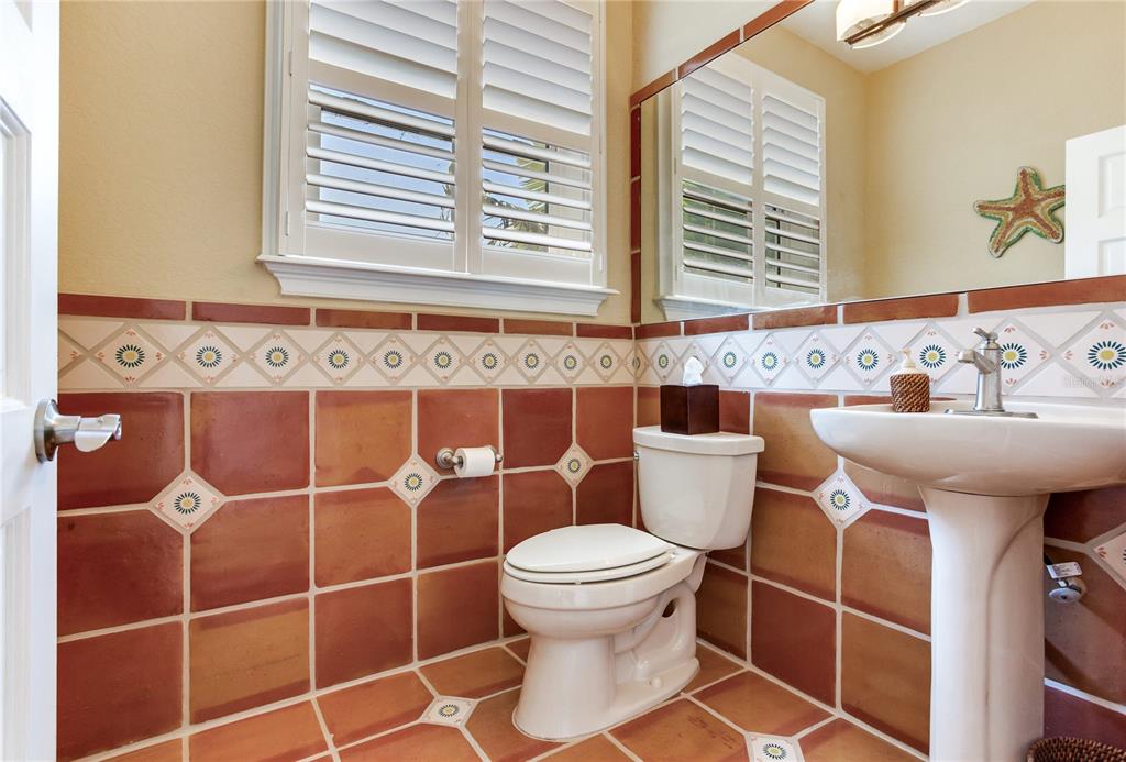 16480 Redington Drive Redington Beach, FL 33708 - Photo 39 of 93 a bathroom with a sink toilet and shower