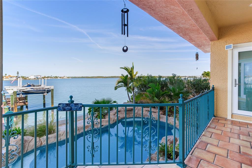 16480 Redington Drive Redington Beach, FL 33708 - Photo 58 of 93 a balcony with an outdoor space