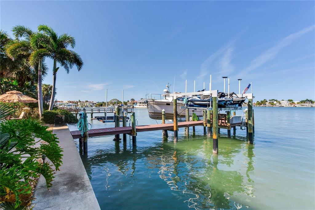 16480 Redington Drive Redington Beach, FL 33708 - Photo 76 of 93 a view of a chairs and table in patio