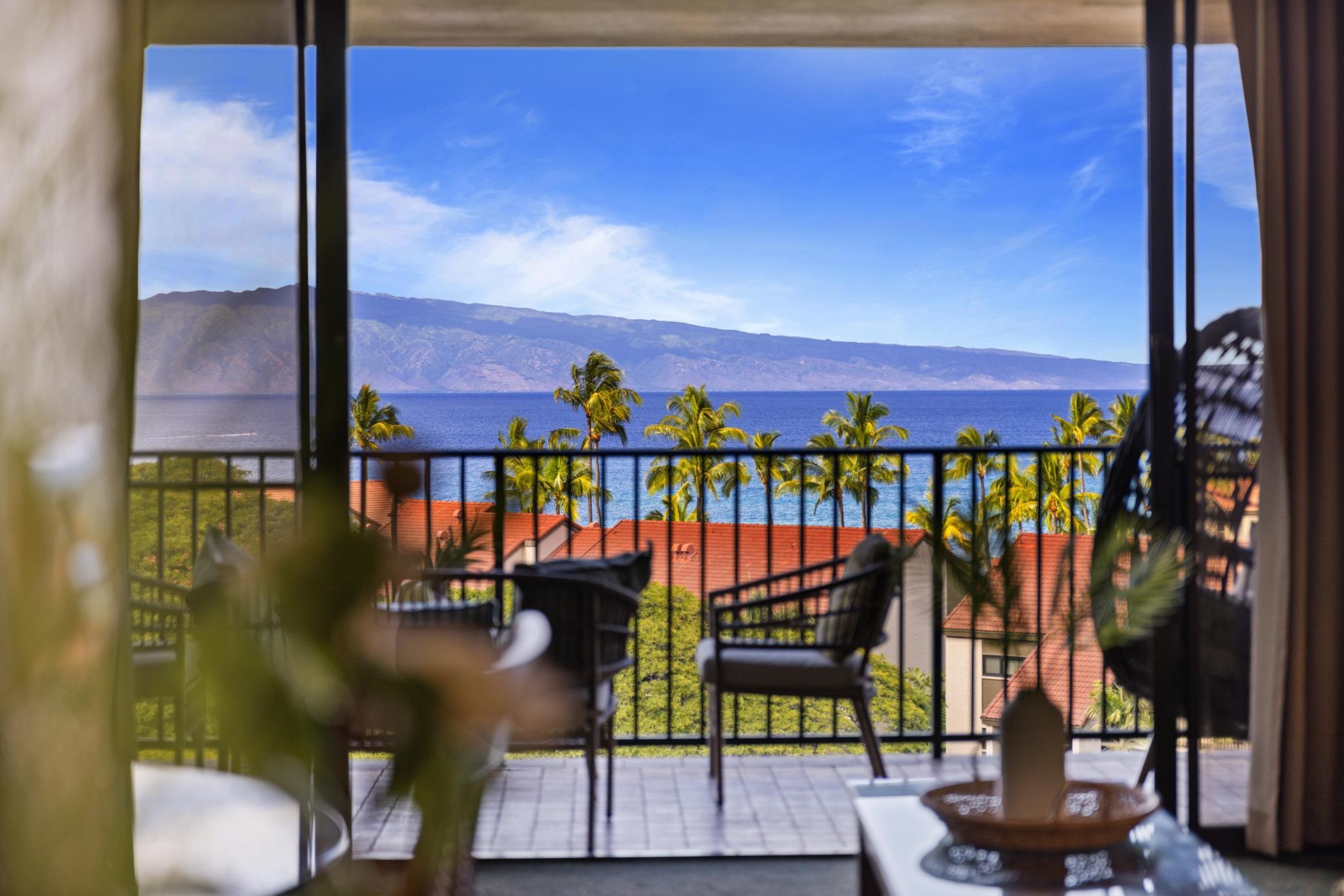 3445 Lower Honoapiilani Road, Unit 826 Lahaina, HI 96761 - Photo 16 of 26 a view of a chairs and table in a balcony