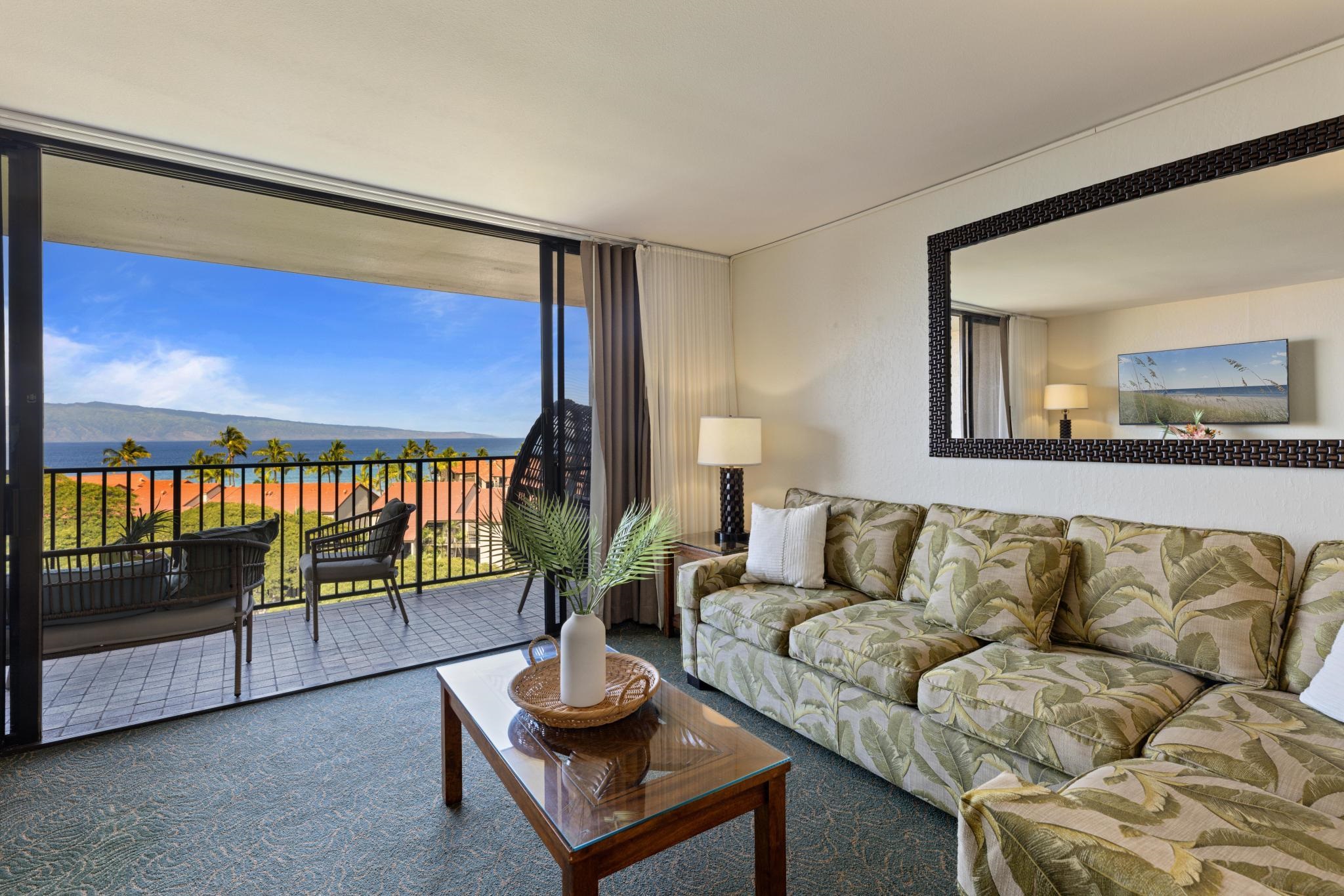 3445 Lower Honoapiilani Road, Unit 826 Lahaina, HI 96761 - Photo 3 of 26 a living room with furniture and a large window