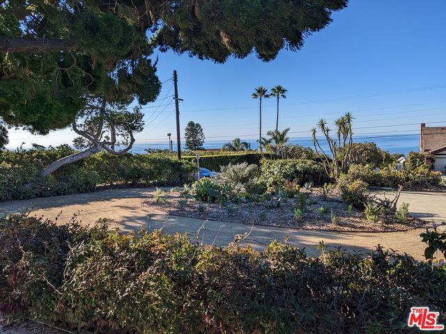 a bedroom with a bed and a fireplace