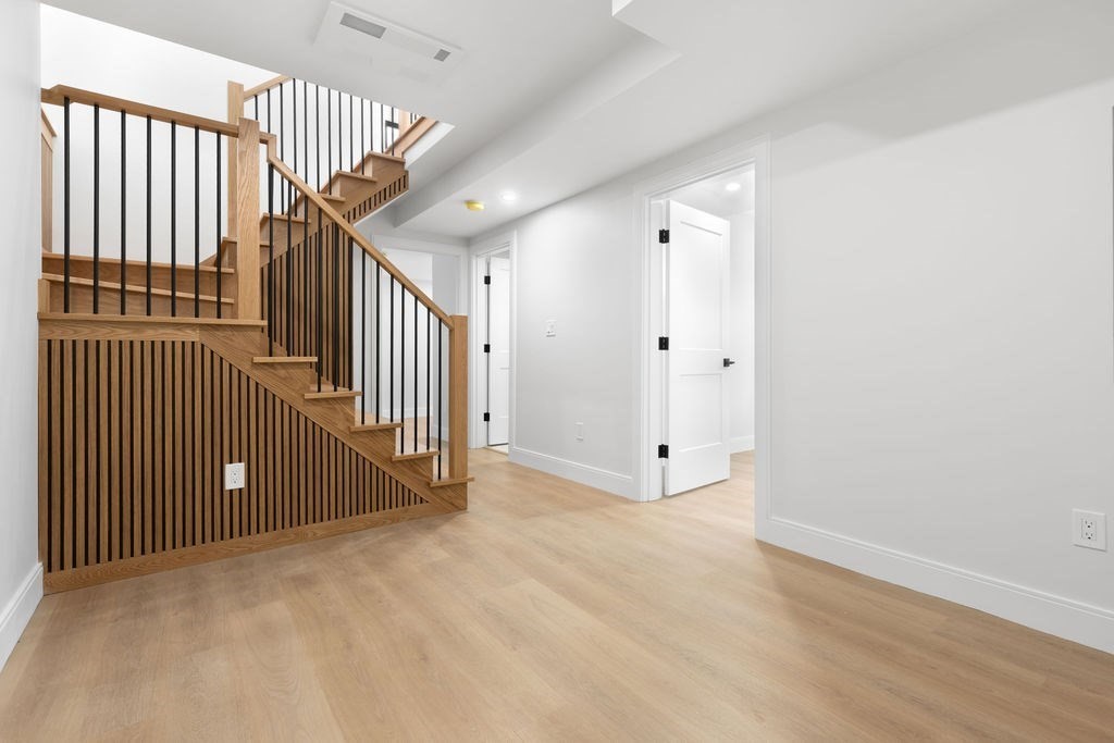 265-267 River Street, Unit 267 Newton, MA 02465 - Photo 14 of 22 a view of a hallway with staircase