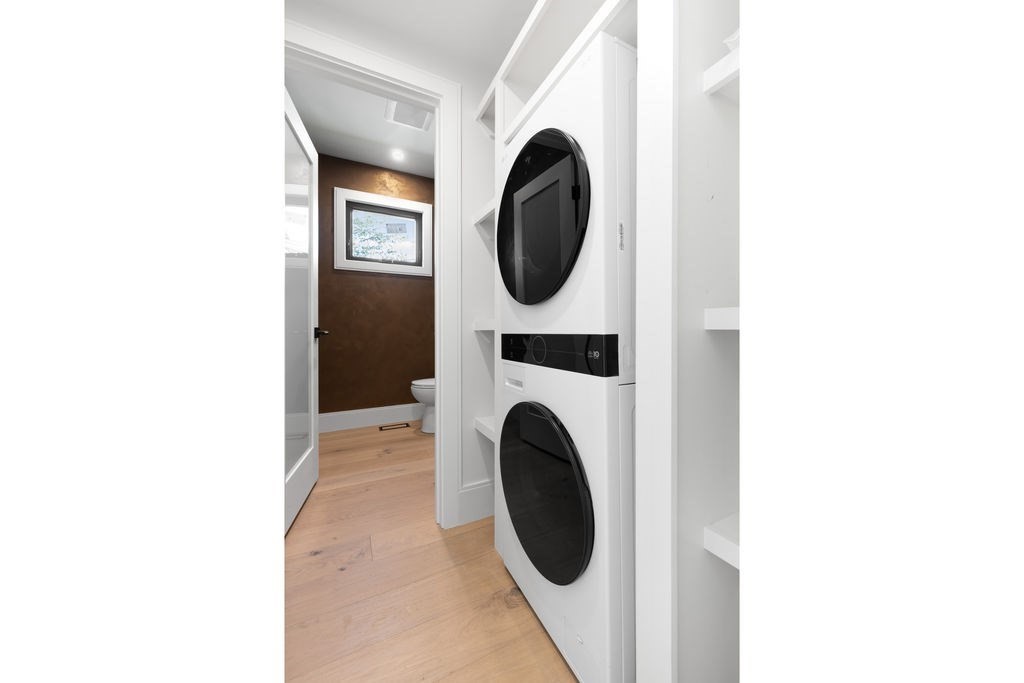 265-267 River Street, Unit 267 Newton, MA 02465 - Photo 10 of 22 a utility room with dryer and washer