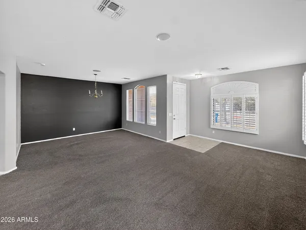 a kitchen with stainless steel appliances granite countertop a refrigerator sink and cabinets